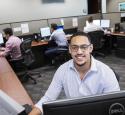 Young male Kooilspetroleum Information Systems employee