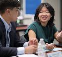 Two students speak with each other at the Freshman Engineering Summit